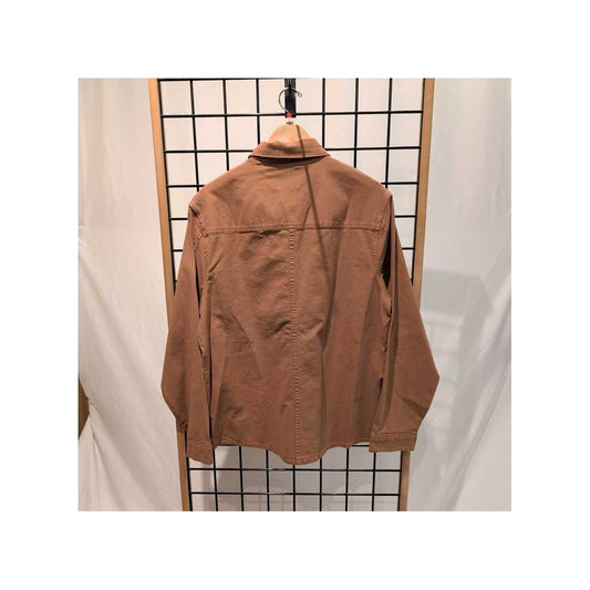 Back view of the Prana Mens Rock Ridge Overshirt-SAMPLE in Tawny hanging on a grid display with white drapes.
