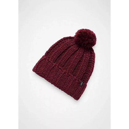 A close-up of the Prana Snow Crystal Beanie in Deep Vino with a pom pom, displayed against a plain white background.