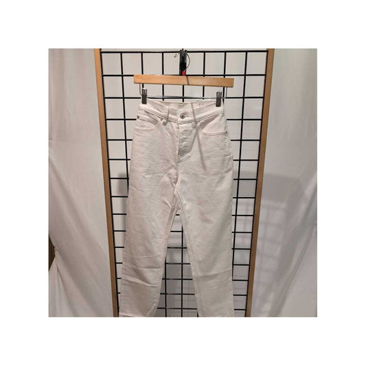 Front view of the Prana Womens Carlsbad 760 Straight Jean 26'-SAMPLE in White Sand hanging on a wooden hanger against a grid background.
