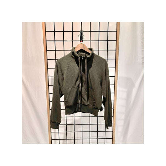 Front view of the Prana Womens Cozy Up Full Zip-SAMPLE in Nori hanging on a wooden hanger against a grid background.
