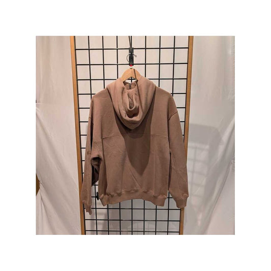 Front view of the Prana Womens DreamFleece Full Zip-SAMPLE in Shroom hanging on a wooden hanger against a grid background.