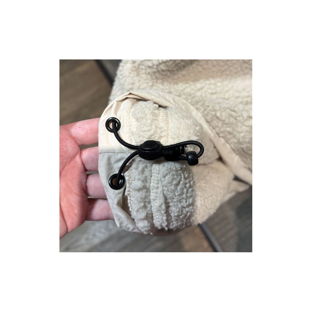 Close-up of the Prana Womens Encinitas Sherpa Crew-SAMPLE in Almond showing the drawstring and toggle on the cuff.