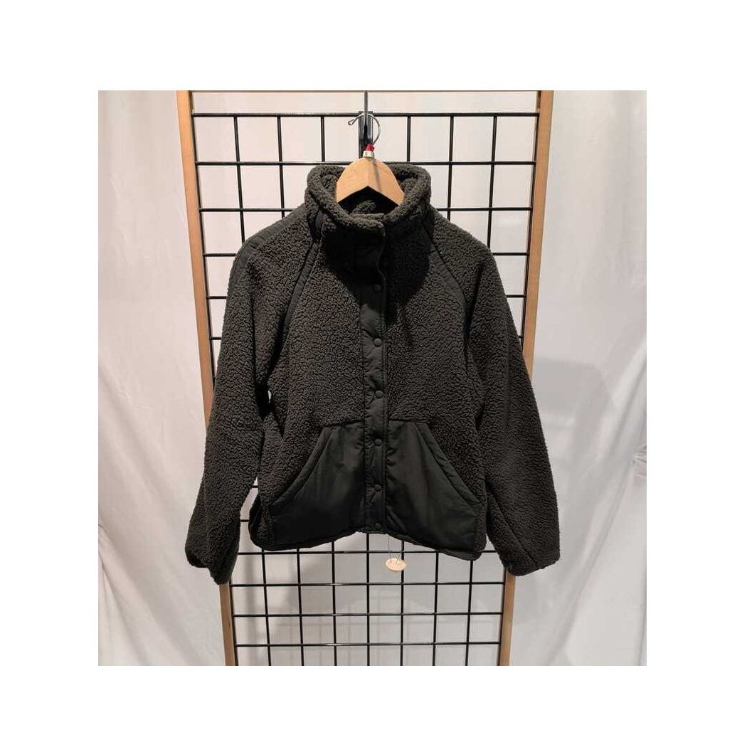 Front view of the Prana Womens Encinitas Sherpa Jacket-SAMPLE in Nori hanging on a wooden hanger against a grid background.