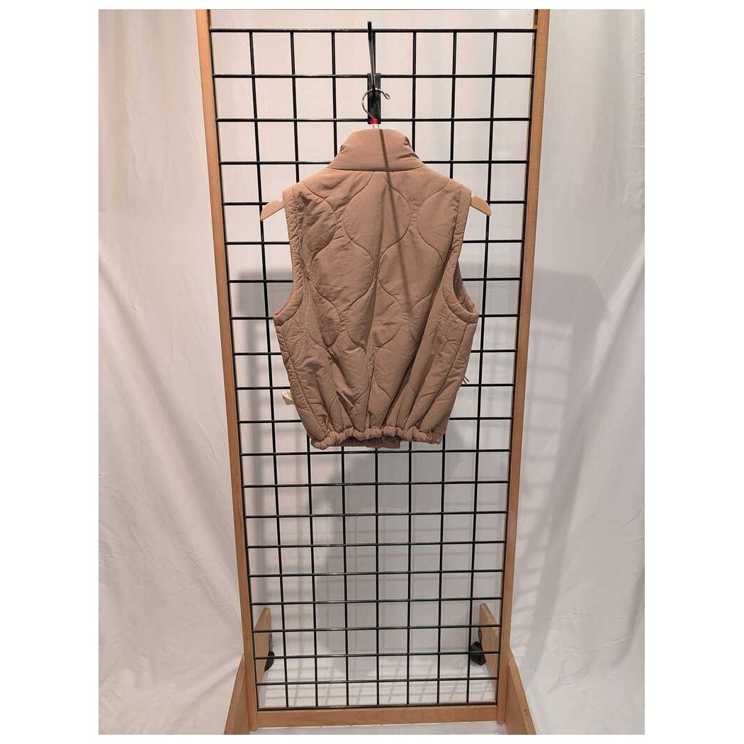 Back view of the Prana Womens Encinitas Vest-SAMPLE in Shroom hanging on a grid display against a white backdrop.