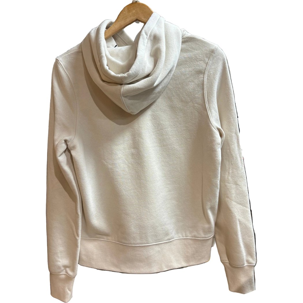 Back view of the Prana Womens Everyday Hoodie-SAMPLE in Canvas hanging on a wooden hanger against a white background.