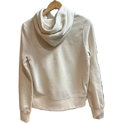 Back view of the Prana Womens Everyday Hoodie-SAMPLE in Canvas hanging on a wooden hanger against a white background.