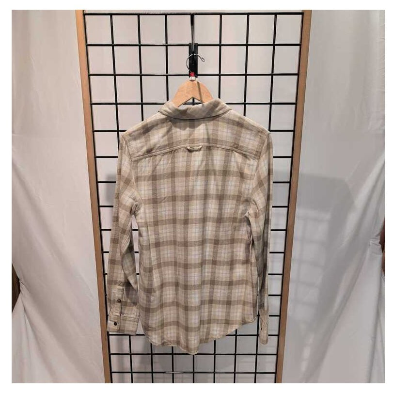 Back view of the Prana Womens Golden Canyon Flannel-SAMPLE in Stone hanging on a grid with white drapes.