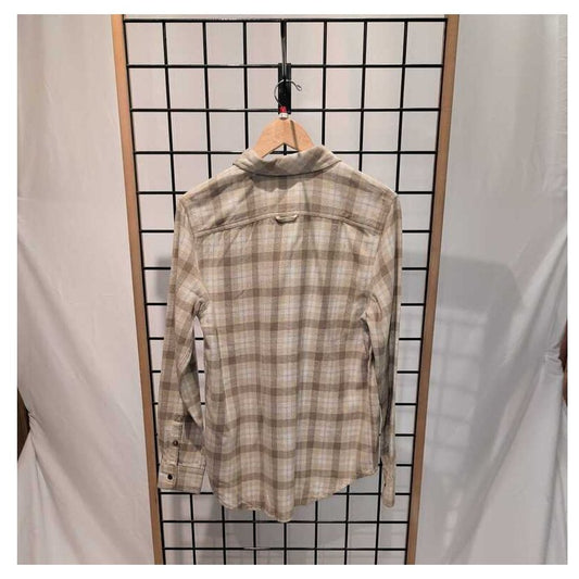 Back view of the Prana Womens Golden Canyon Flannel-SAMPLE in Stone hanging on a grid with white drapes.