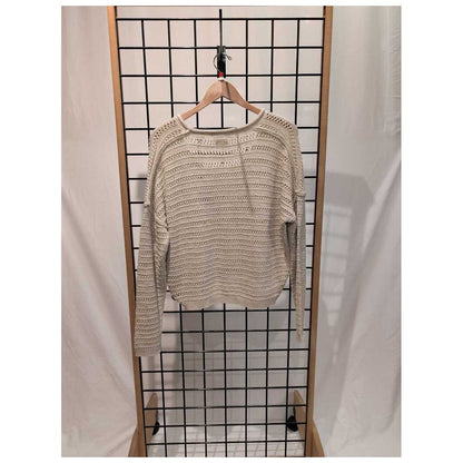 Front view of the Prana Womens Malibu Lagoon Sweater-SAMPLE in Stone Marl hanging on a wooden hanger against a grid background.