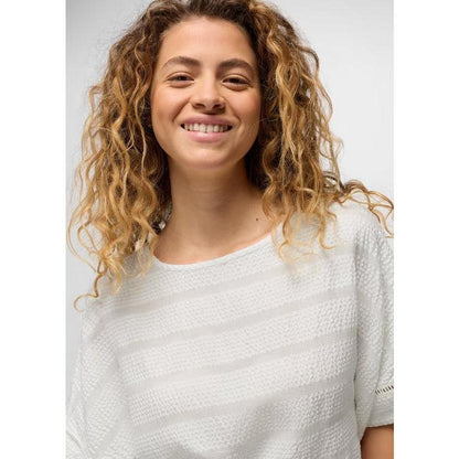 A front view of the Prana Women's Ocean Hills Top in Alba on a model with curly hair against a light background.
