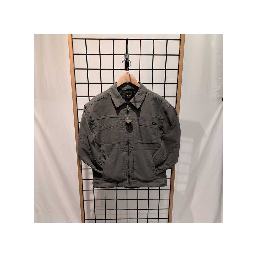 Front view of the Prana Womens Rock Ridge Jacket-SAMPLE in Thyme hanging on a wooden hanger against a grid background.