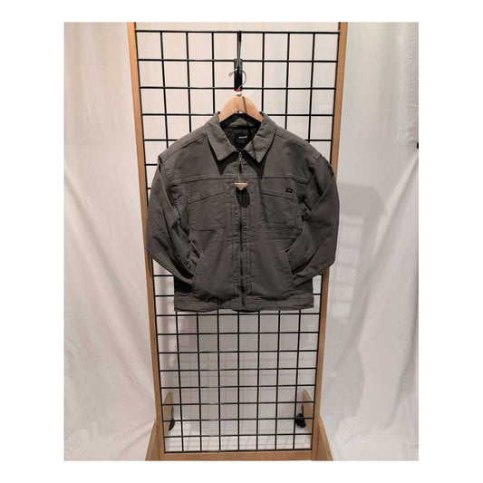 Front view of the Prana Womens Rock Ridge Jacket-SAMPLE in Thyme hanging on a grid display against a white backdrop.