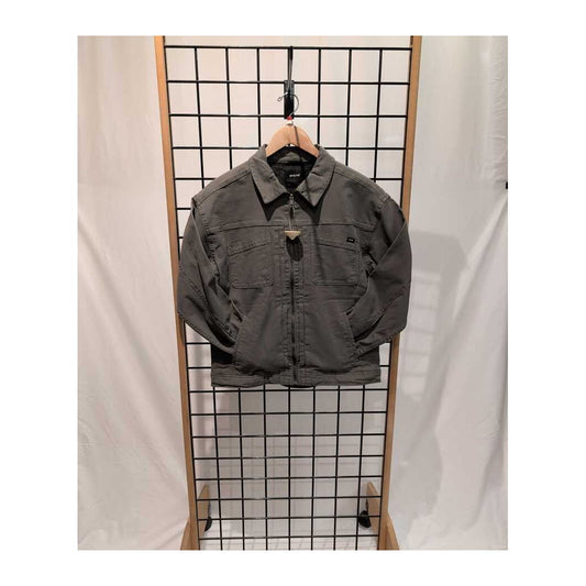 Front view of the Prana Womens Rock Ridge Jacket-SAMPLE in Thyme hanging on a grid display with a white backdrop.