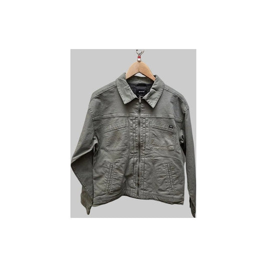 Front view of the Prana Womens Rock Ridge Jacket-SAMPLE in Thyme hanging on a wooden hanger against a gray background.