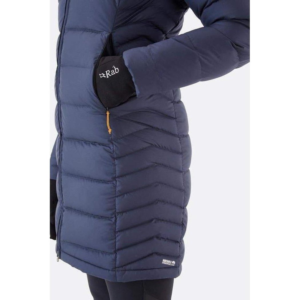 Side view of the Rab Women's Deep Cover Parka in Army showing the front pocket and black glove against a white background.