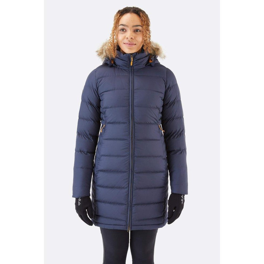 A front view of the Rab Women's Deep Cover Parka in Army color, showing the model wearing it with black gloves against a plain white background.