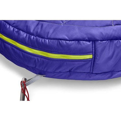 A close-up of the Ruffwear Highlands Dog Sleeping Bag in Huckleberry Blue showing the yellow zipper and a metal clip with red cord attached.