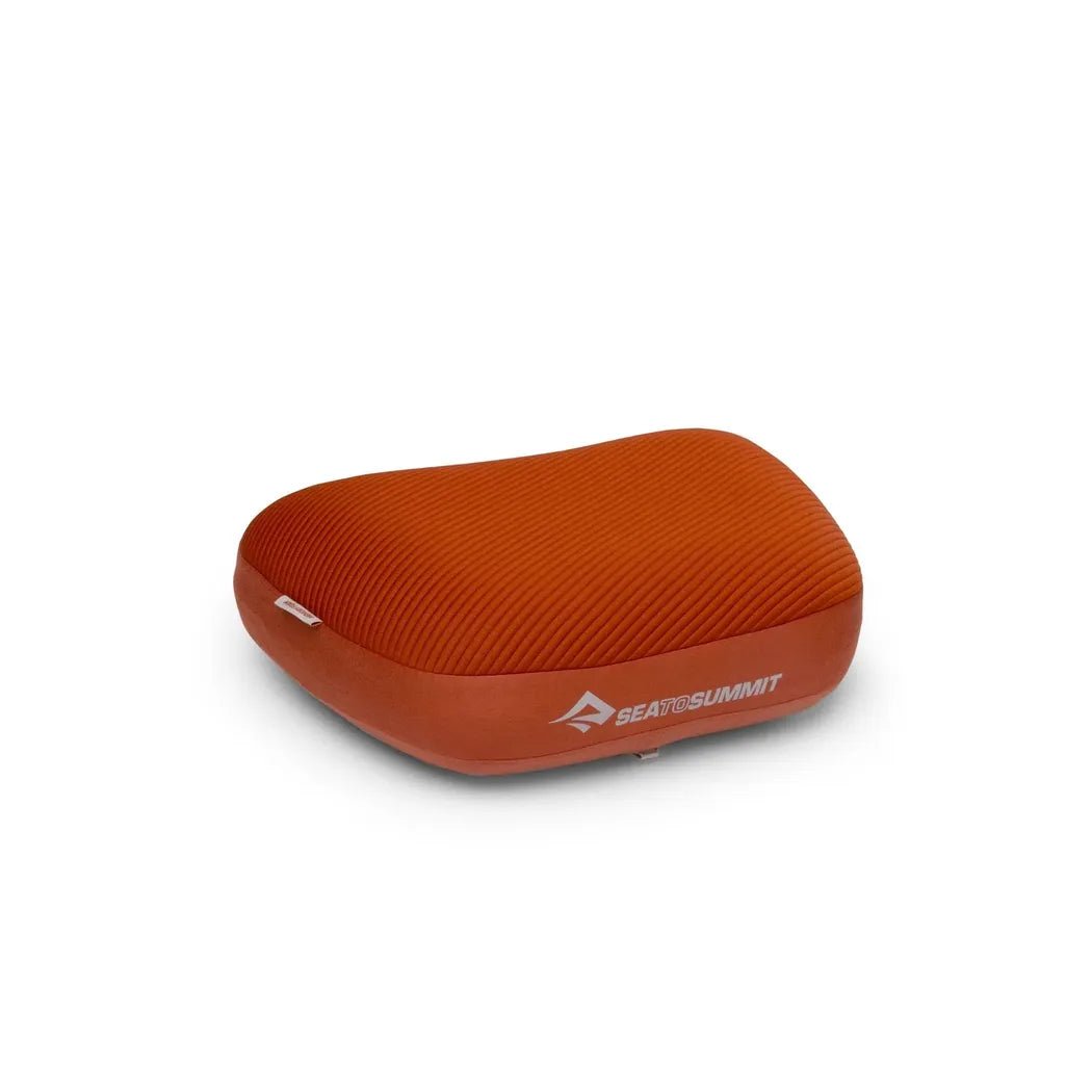 A front view of the Sea To Summit Aeros Premium Pillow in Burnt Olive with a white background.