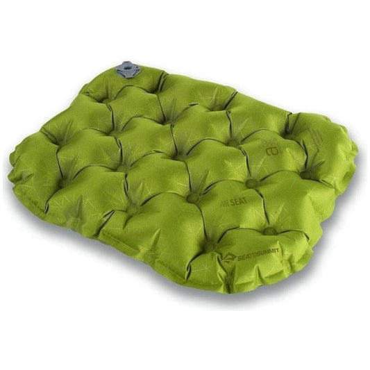 A top-down view of the Sea To Summit Air Seat in green with a valve visible on the upper left against a white background.