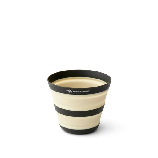 A top-down view of the Sea To Summit Frontier UL Collapsible Cup - 12oz in Bone White with black stripes against a white background.
