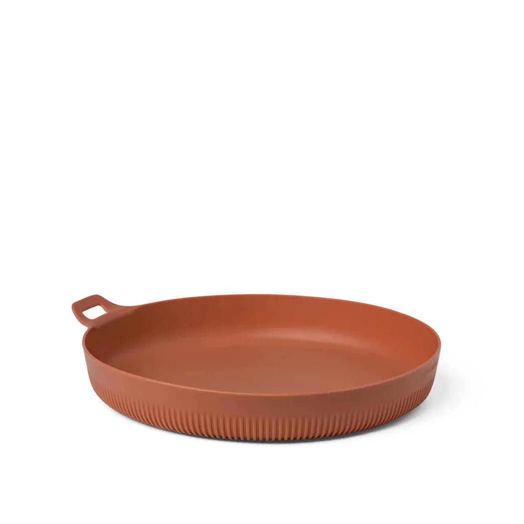 A top-down view of the Sea To Summit Horizon Plate - L in Bombay color with a handle and ribbed edge, set against a plain white background.