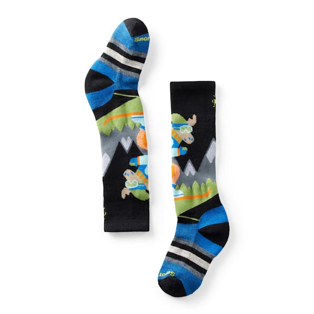 Side view of the Smartwool Kid's Wintersport Full Cushion Mountain Moose OTC Socks in Black showing the moose graphic and mountain design against a white background.