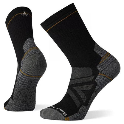 Side view of the Smartwool Performance Hike Full Cushion Crew socks in Black showing the reinforced heel and toe against a white background.
