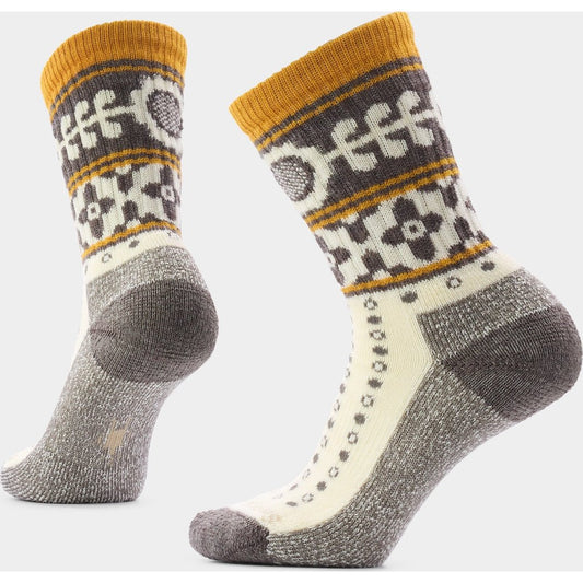 Front and side views of the Smartwool Women's Everyday Cozy Retro Sunflower Crew Socks in Natural, showing the patterned upper and gray heel/toe against a white background.