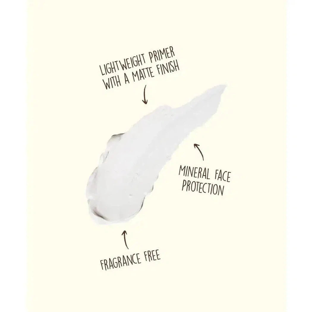 A close-up of Sun Bum Mineral SPF 30 Sunscreen Lotion showing its lightweight primer with a matte finish, mineral face protection, and fragrance-free label against a light background.