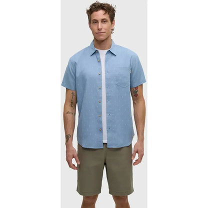 A front view of the Tentree Men's Small Tree Mancos Shirt in Lake Blue Small Tree worn by a model against a plain background.