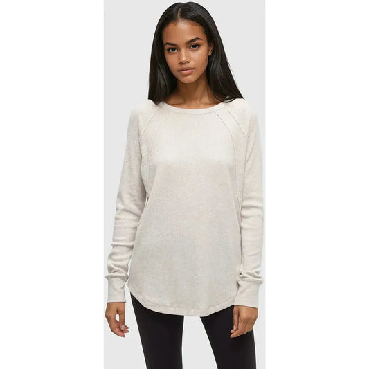 A front view of the Tentree Women's Storey Longsleeve in Vintage White Heather on a model wearing black pants against a light gray background.