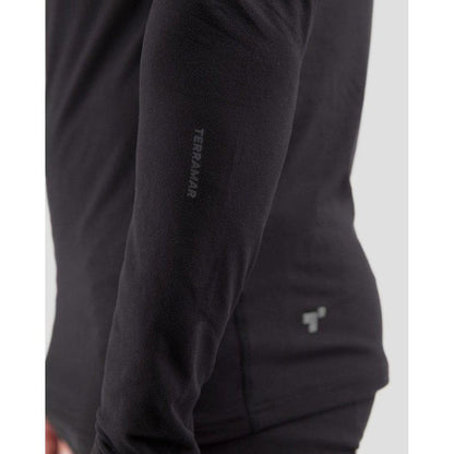 A close-up of the Terramar 2.0 Men's Thermolator Performance Turtle Neck in Black, showing the Terramar logo on the sleeve and a small logo on the chest.