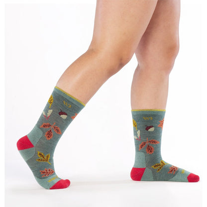 Side view of the Wide Open Women's Fall In Love Cushioned Crew Socks in Seafoam with a model wearing them against a white background.