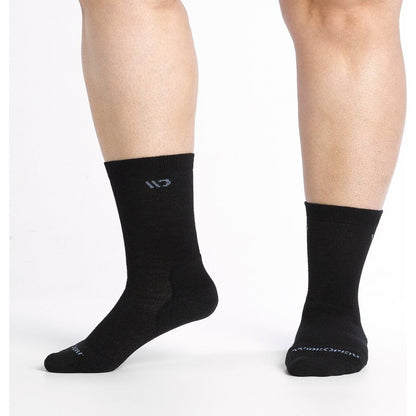 Front view of the Wide Open Women's Solid Cushioned Crew Socks in Black on a model's legs against a white background.