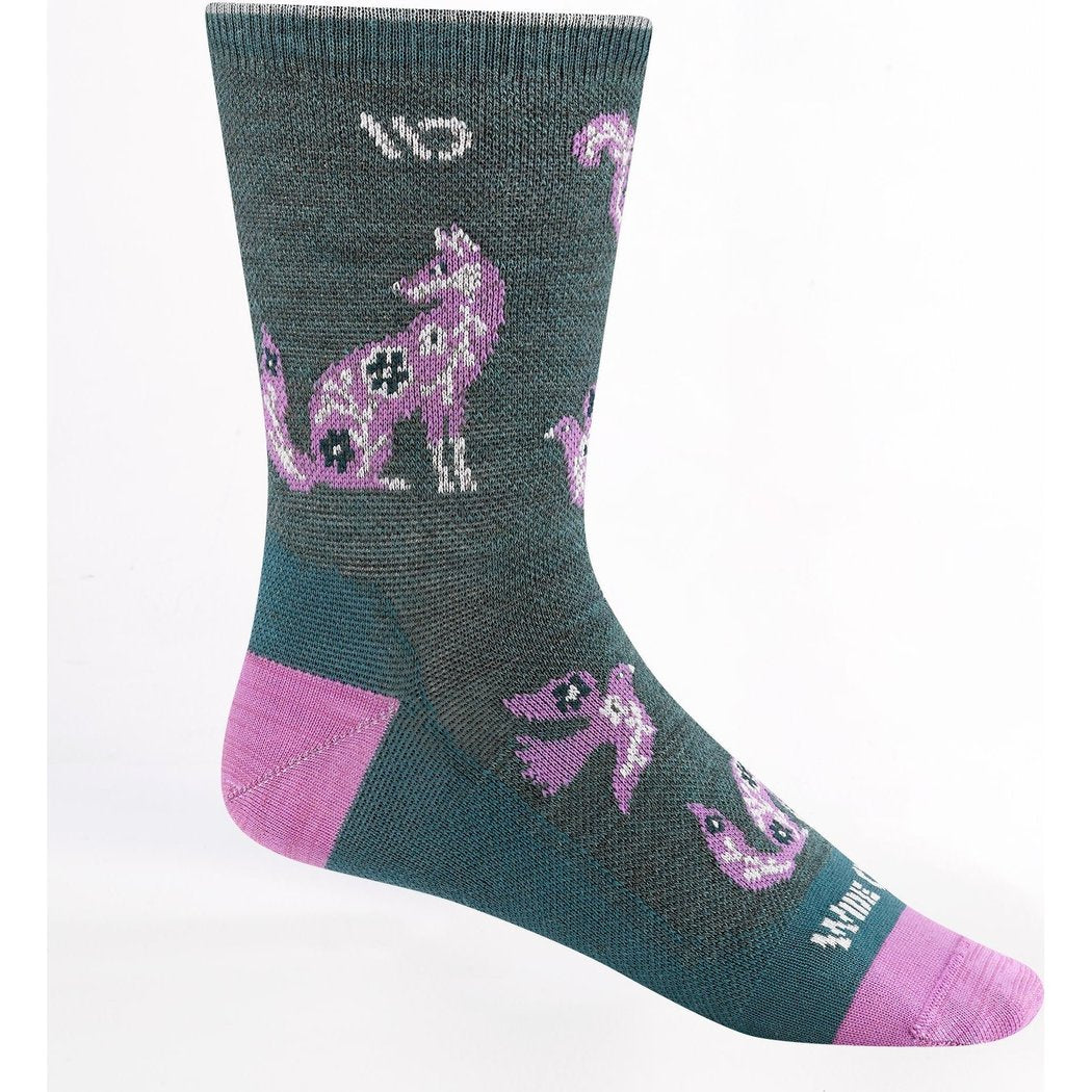 Side view of the Wide Open Women's Woodland Wonder No Cushion Micro Crew Socks in Teal showing pink fox designs and a white background.